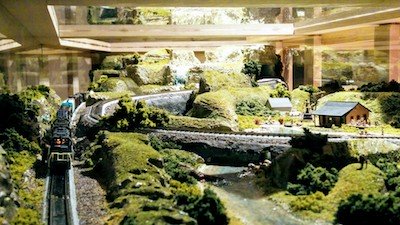 Beautiful Scenery Inside Model Railroad in a Bar