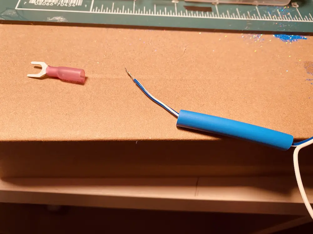 Connector, wire and heat-shrink tubing