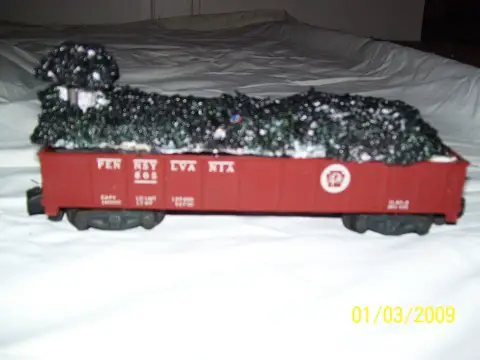 Gondola with coal load and sound mechanism installed